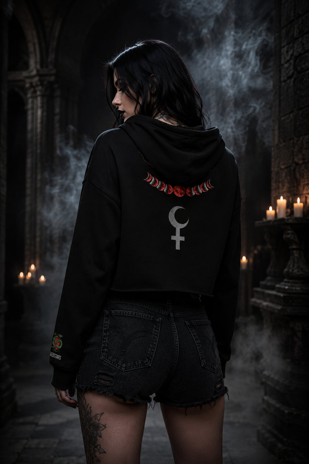 Black cropped hoodie back view with moon phases and Venus symbol