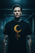 Man wearing a black t-shirt with a gold symbol on a dark background